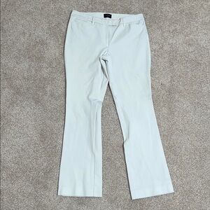 White Flare Pants with Mid-Rise Waist and Minimalist Design